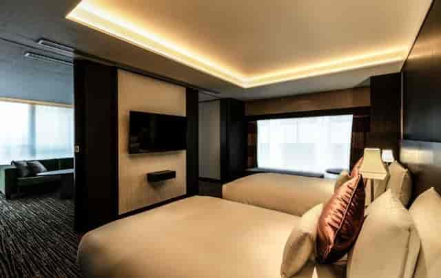 Luxury Stadium Suite at Hotel Allamanda Aoyama, spacious living room for VIP event hospitality.
