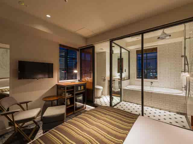 Modern Ebisu Holic Hotel lounge for upscale corporate business travel and lifestyle rest.