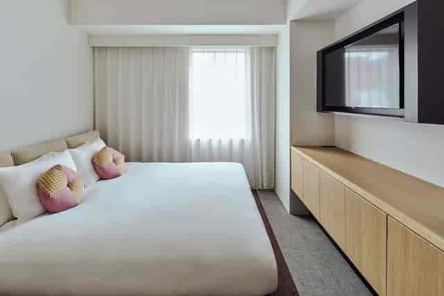 Modern meeting room at OMO3 Tokyo Akasaka with sleek minimalist decor for corporate events.