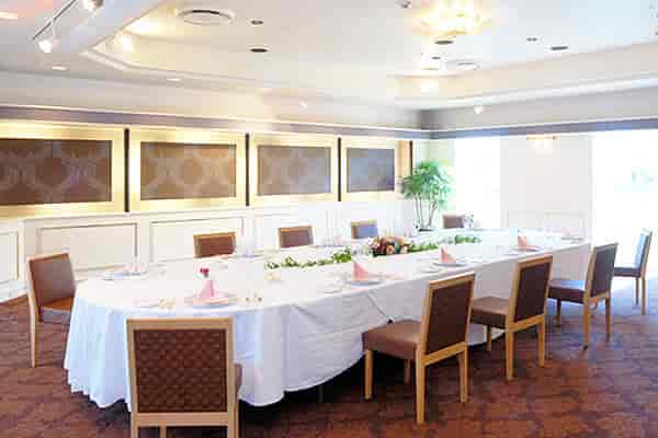 Boardroom at Rembrandt Hotel Tokyo Machida: oval table for executive meetings and corporate events.