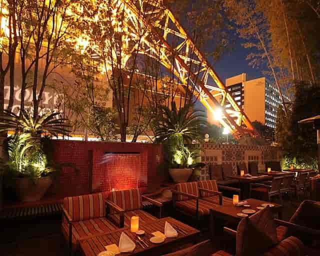 Rooftop VIP reception at Terrace Dining TANGO with ambient lighting for high-end events.