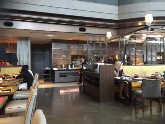 Upscale restaurant venue with booth seating, ideal for corporate networking and VIP breakfast events.