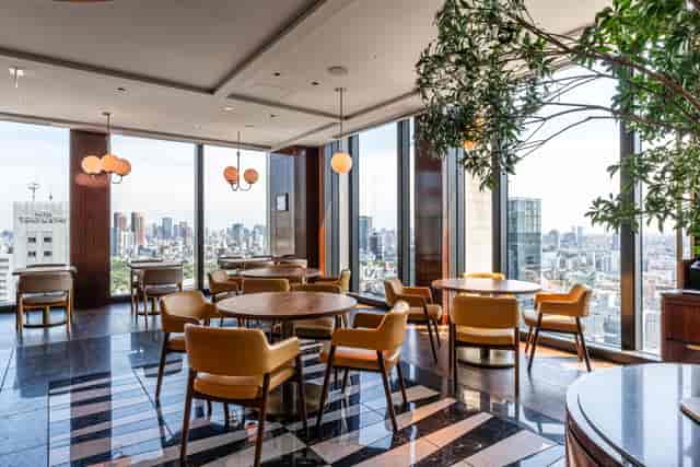High-end Rossi restaurant venue with floor-to-ceiling views for VIP receptions and networking.