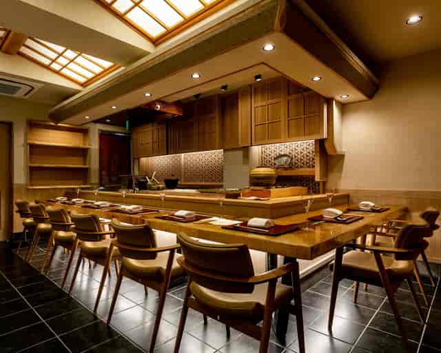 Private dining room with chef’s table setup for VIP events and networking.