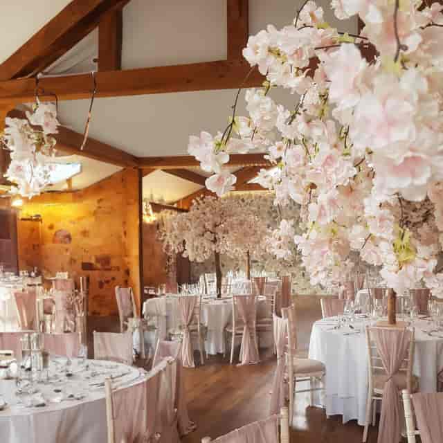 Fleur Ballroom romantic cherry blossom tablescape for upscale weddings and gala events.