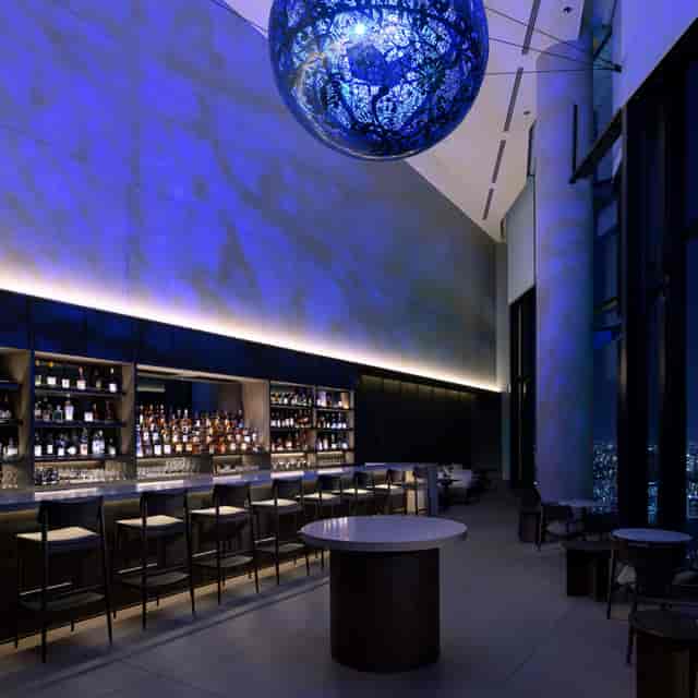 Luxury lounge at BELLUSTAR TOKYO with skyline views for C-suite receptions and networking events.
