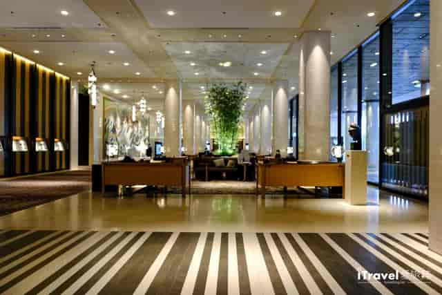 Modern hotel lobby for corporate event registration and VIP networking at Grand Prince Pamir.
