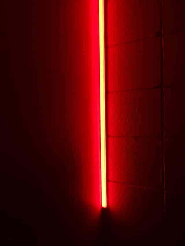 Modern VIP lounge in Tokyo with moody architectural accent lighting for evening events.
