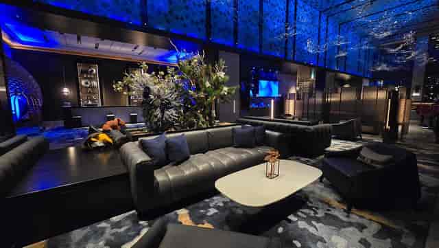 Luxury VIP lounge with moody lighting at Mesm Tokyo for upscale corporate networking events.