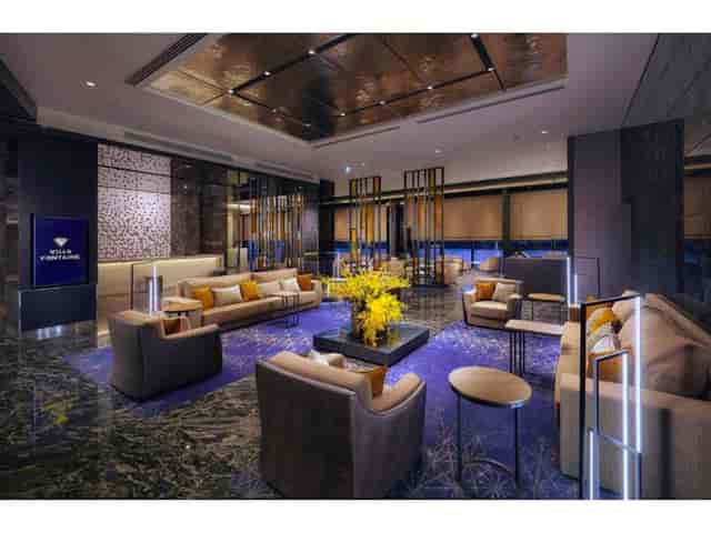 Upscale hotel meeting room with flexible lounge seating for VIP receptions and networking events.