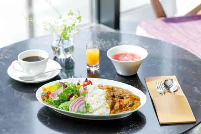 Wald Haus board room corporate lunch catering with minimalist table setting.