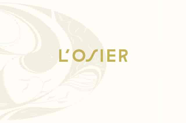 Minimalist L'OSIER restaurant interior for corporate gala and VIP hospitality.