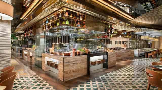 Chef-driven buffet station for premium corporate networking receptions and event catering.
