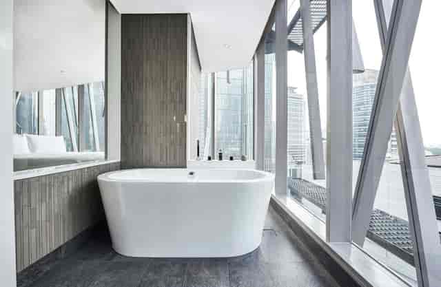 Luxury pre-function space with Jakarta skyline views for incentive travel and executive retreats.
