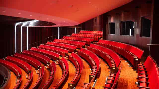 Raked auditorium at JIEXPO Convention Centre for professional keynote and corporate event hosting.