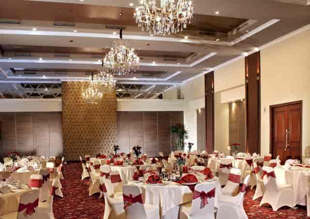 Arion Suites Kemang ballroom with elegant chandeliers for corporate galas and wedding events.