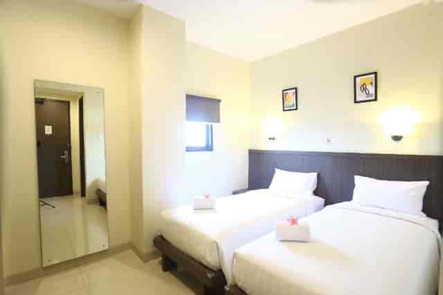 Harlys Residence hotel twin room for budget business event travel accommodation.