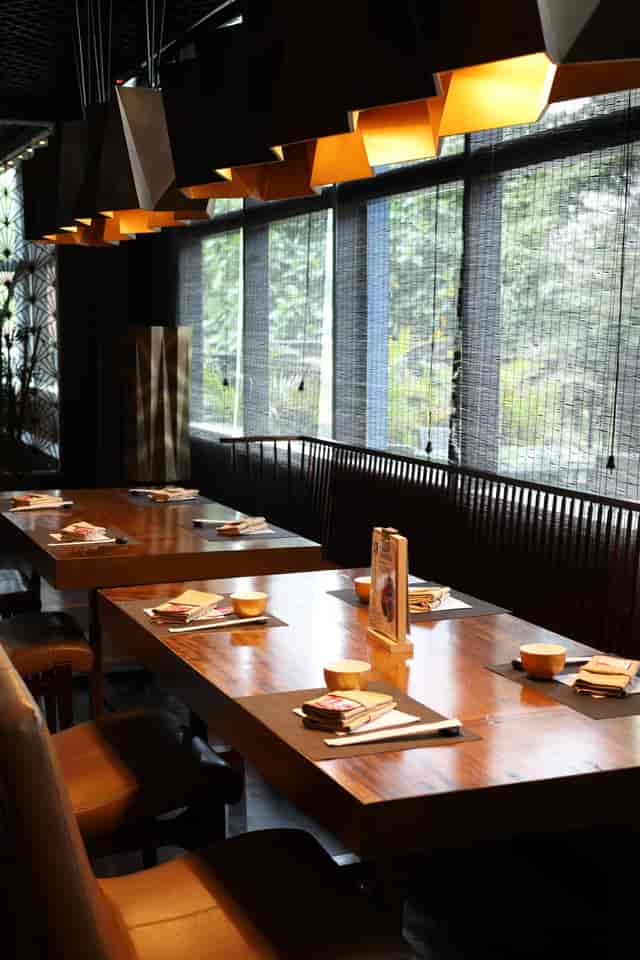 Yoshi Izakaya restaurant interior for sophisticated business dinners and private networking events.