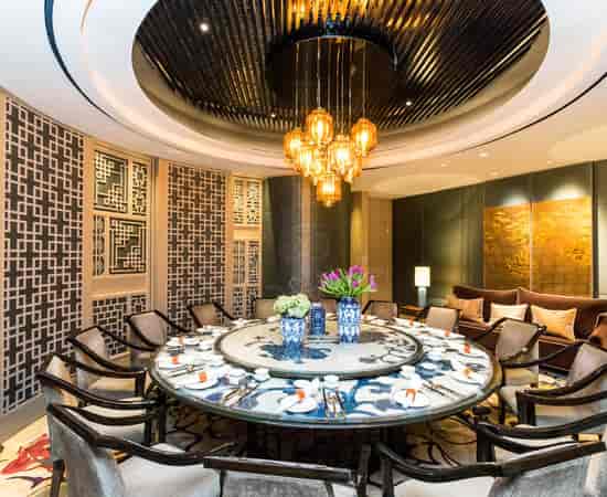Upscale Li Feng private dining room with pendant lighting for executive meetings and gala dinners.