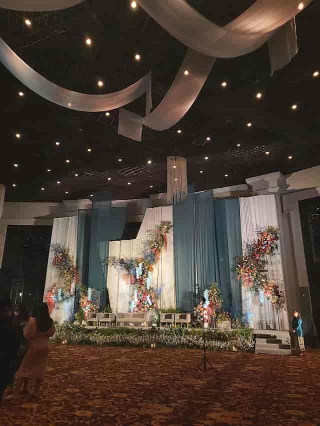 The Atrium, Sampoerna Strategic Square with elegant teal drapery for high-end gala event venue.