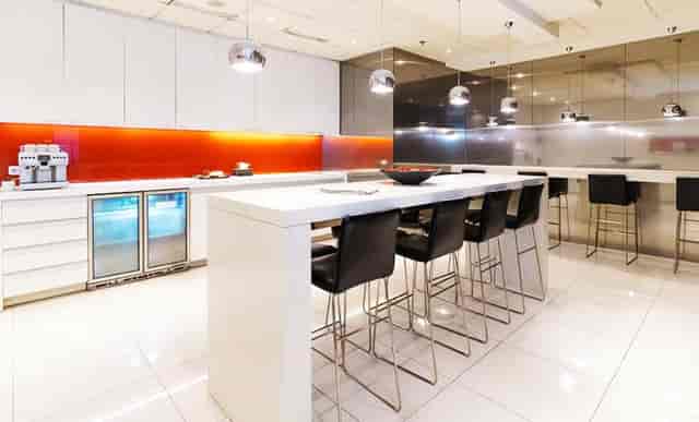 Modern breakout room at Sampoerna Strategic Square for corporate event networking and coffee breaks.