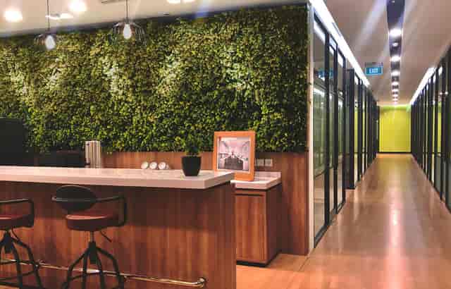 Modern biophilic breakout area at MATRIX Smart Suite for corporate event networking.