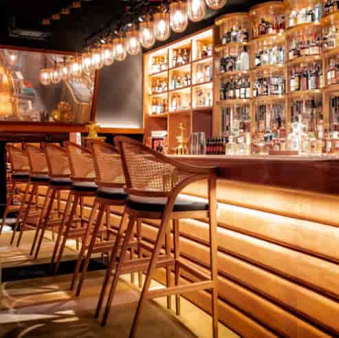 Private dining room at The Guild with ambient lighting for VIP receptions and networking events.