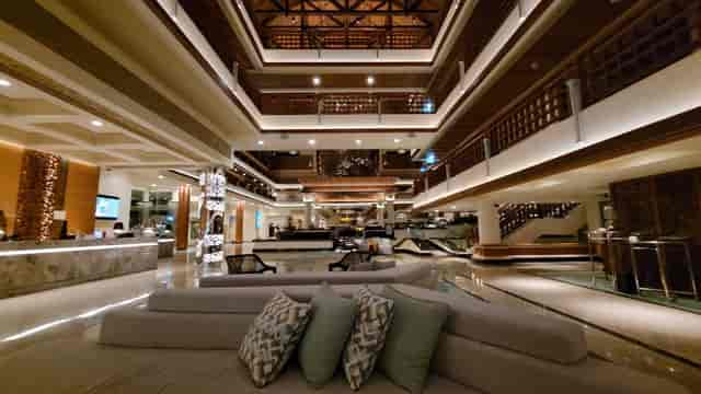 Bali International Convention Centre Denpasar Room: upscale multi-level event registration lobby.
