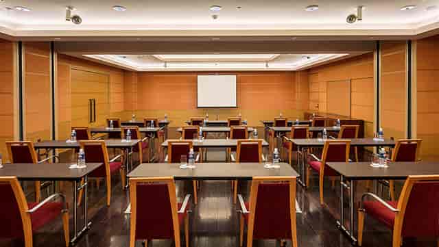 Brooklyn Suite schoolroom setup, Tokyo American Club meeting room for professional training events.