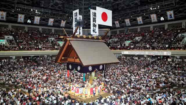 Kokugikan arena 360-degree central stage for sold-out concert and live event production.
