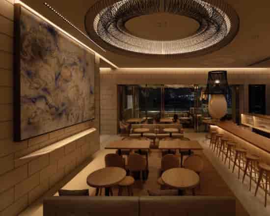 Upscale BALCON TOKYO lounge with tiered seating, ideal for corporate networking and cocktail events.