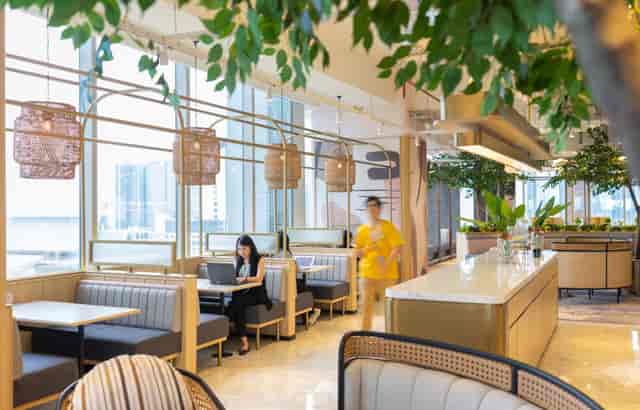 GoWork ASG Tower biophilic coworking space with private booths for corporate events and networking.