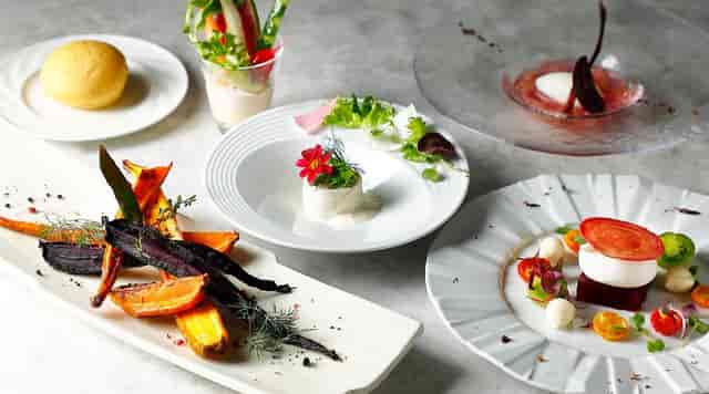 High-end multi-course banquet menu with artistic plating for luxury gala and VIP dinner events.