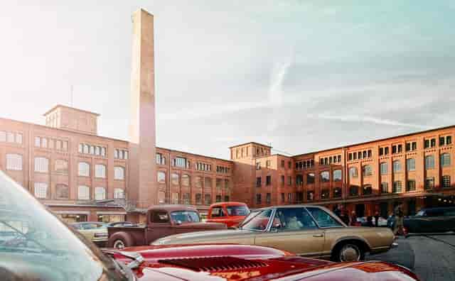 Industrial-chic Kiesfläche event space with brick architecture for car launches and corporate events.