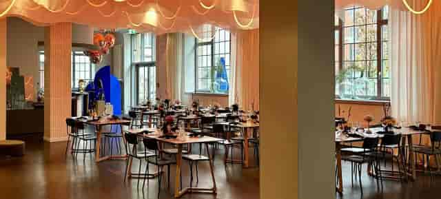 Modern GOOSE Eventspace with banquet seating, perfect for corporate dinners and social events.