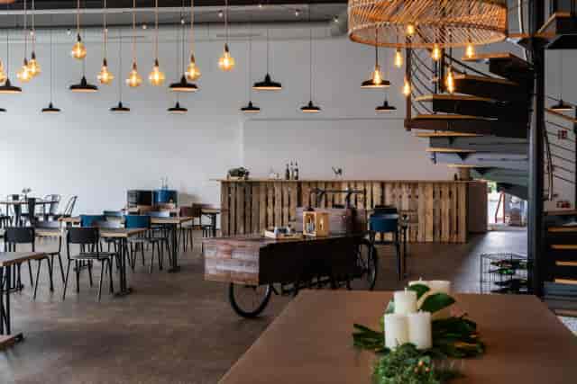 Industrial-chic Mainfloor at Maindock with pallet bar for networking and corporate events.