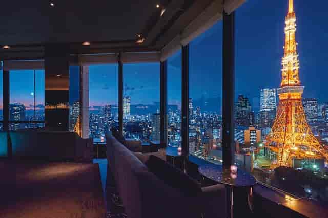 Luxury suite event venue at The Prince Park Tower Tokyo with iconic Tokyo Tower skyline backdrop.