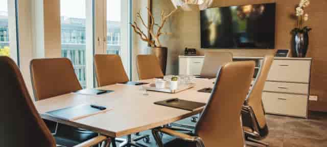 Nextower boardroom with ergonomic chairs for professional corporate meetings and event rental.