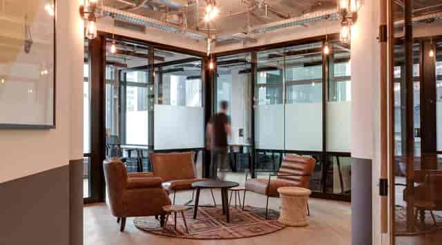Modern Mindspace Eurotheum meeting room with industrial decor for brainstorming and client sessions.
