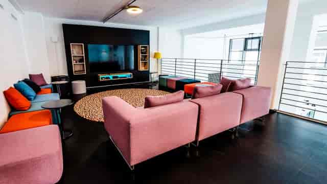 Gaming lounge with plush seating for creative breakout sessions and team collaboration.