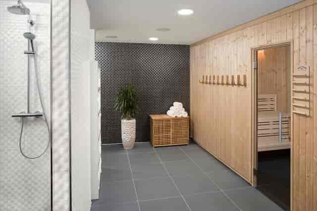 Luxury wellness facility at INNSiDE Frankfurt Ostend for VIP conference events and relaxation.