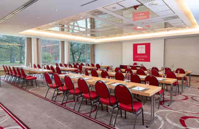 Classroom conference room with natural light for corporate training and workshops.