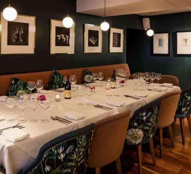 Scott Tallon private dining room with elegant glassware for corporate dinners and networking events.