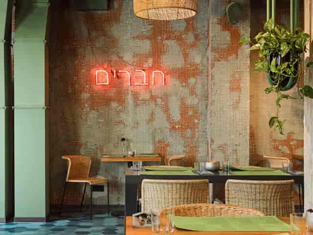 Industrial 25hours Hotel restaurant, neon lighting, ideal for networking dinners and events.