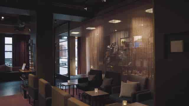 Plush club seating at Oost Bar 25hours Hotel, ideal for professional networking and corporate events.
