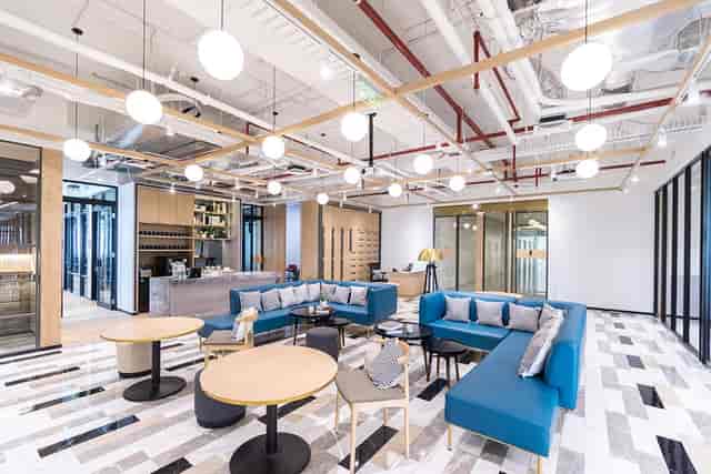 Modern meeting room with modular seating for networking and small group collaboration.