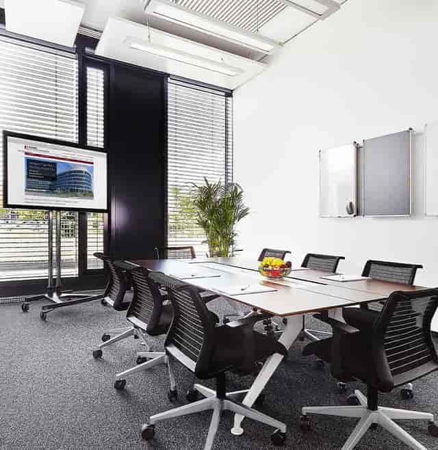 Modern boardroom with ergonomic seating for high-impact business meetings and corporate events.