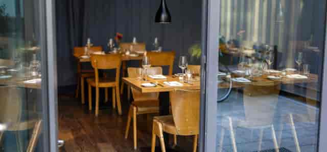 Intimate bistro dining at Exclusive Restaurant, perfect for corporate dinner and networking events.