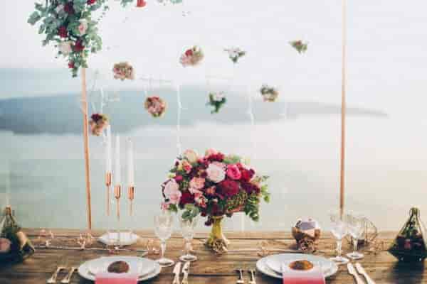 Luxury micro-event tablescape with copper accents and floral decor for destination weddings.