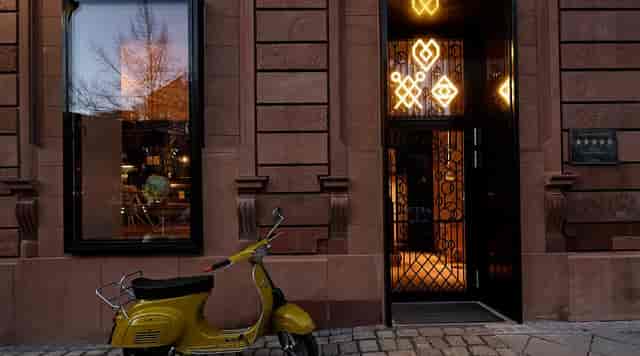 Boutique coffee shop exterior with curb appeal for intimate gatherings and creative off-sites.